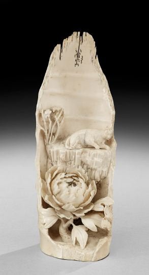 Chinese Ivory Carving: Chinese Ivory Carving, early 20th century, study of a cat with a flowering peony and a butterfly, h. 8".