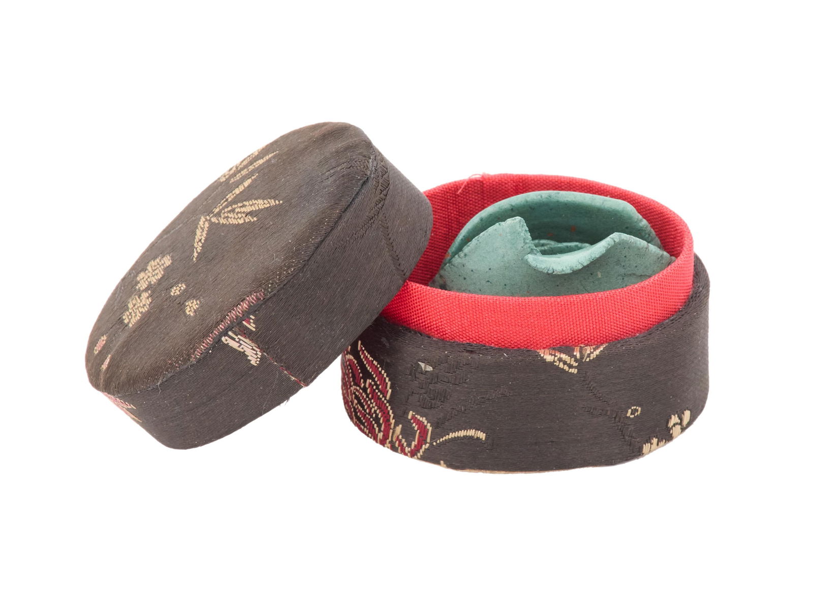 Hannah Wilke (American, 1940-1992): Hannah Wilke(American, 1940-1992)"Untitled"glazed ceramicincised signature at bottom, in the original fabric-covered oval box.box h. 1-3/8", w. 1-7/8", d. 1-3/8" Provenance: Private collection, New Or