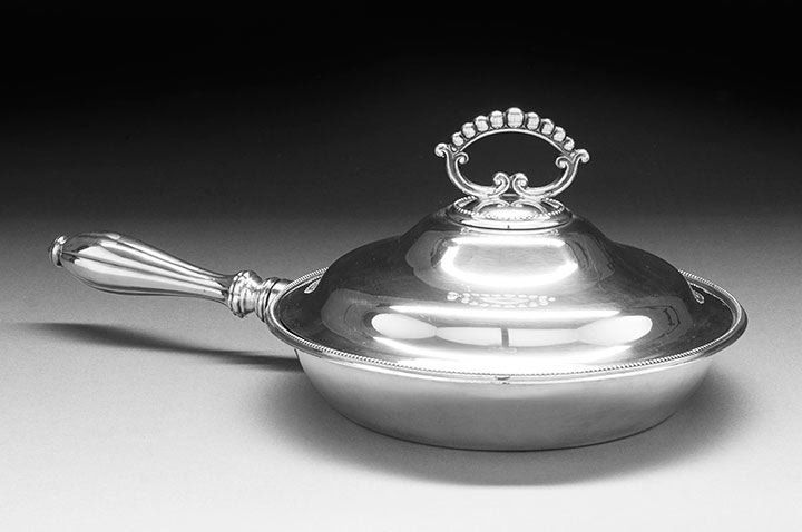 George V Silverplate Vegetable Dish: George V Silverplate Vegetable Dish, first quarter 20th century, by William Hutton & Sons, Sheffield, of circular form, with beaded rim and detachable baluster handle of lobed section, the fitted ogee