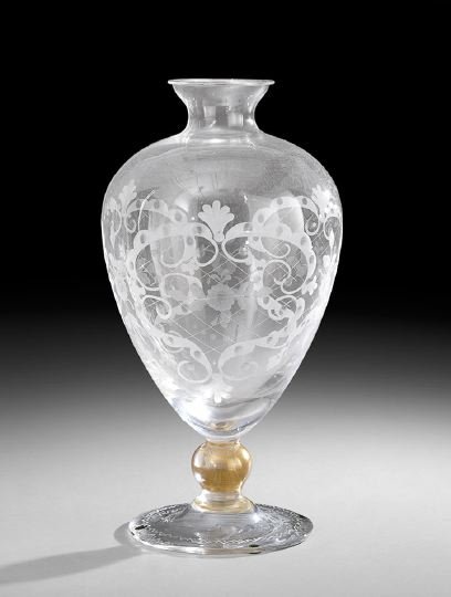 Engraved Venetian Footed Vase: Engraved Venetian Footed Vase, the flat base supports a gold-flecked ball stem supporting the vase, engraved with cross-hatched and scrolled escutcheons decorated with engraved flowers, signed "Inciso
