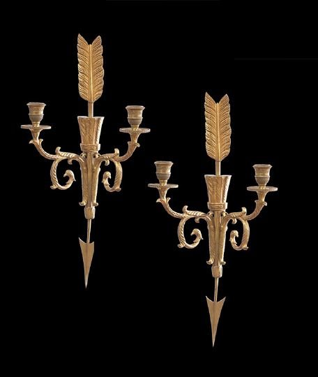 Pair of French Empire-Style Gilt-Bronze Sconces: Pair of French Empire-Style Two-Light Gilt-Bronze Sconces, first quarter 20th century, the quiver and arrow form backplates mounted with leaf-molded scrolled candle arms set with engine-turned candle 