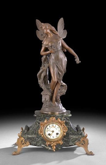 French Art Nouveau Marble Mantel Clock: French Art Nouveau Marble Mantel Clock, fourth quarter 19th century, the bronze finished statue of a winged female in a diaphanous gown, the green marble case with works signed "A.D. Mougin", the enam