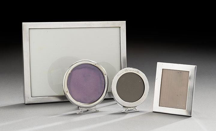 Four American Sterling Silver Photograph Frames: Collection of Four American Sterling Silver Photograph Frames, first quarter 20th century, including two rectangular examples, one by Unger Brothers, 8-1/4" x 6-1/8", the other by Graff, Washbourne &