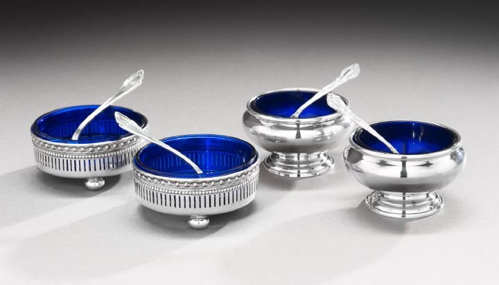 Two Pairs of Silver Salt Cellars and Spoons: Two Pairs of American Sterling Silver Salt Cellars and Spoons, second quarter 20th century, including two pairs of salt cellars, one pair by Gorham, of bulbous "cauldron" form with molded rim and foot