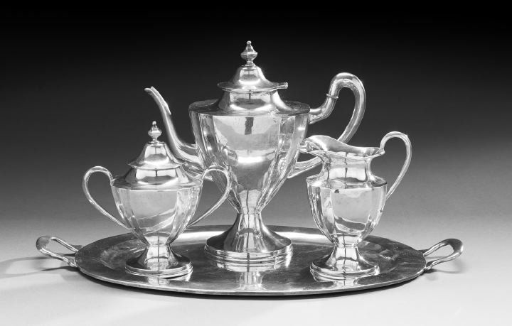 Mexican Three-Piece Sterling Tea Set and Tray: Mexican Three-Piece Sterling Silver Tea Set and Tray, third quarter 20th century, Mexico City, the tea set by Luella and including a teapot, h. 10", l. 10-1/4", covered sugar bowl, h. 6-3/4", w. 6-1/2