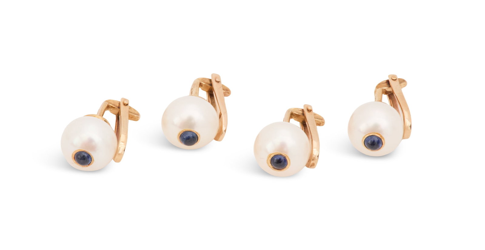 Pearl and Sapphire Stud Set: Pearl and Sapphire Stud Set 10k yellow gold, the set mounted with white button pearls measuring approximately 9.50mm, set with cabochon-cut sapphires weighing approximately 0.40 carats in total. total