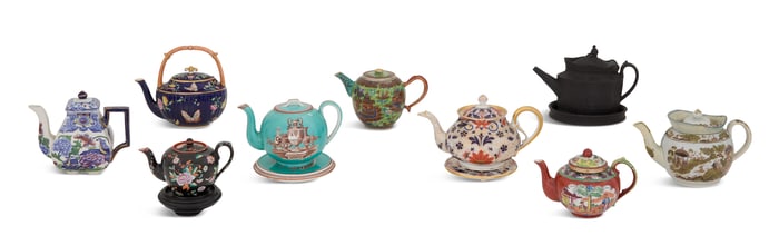 Nine Pottery and Porcelain Teapots