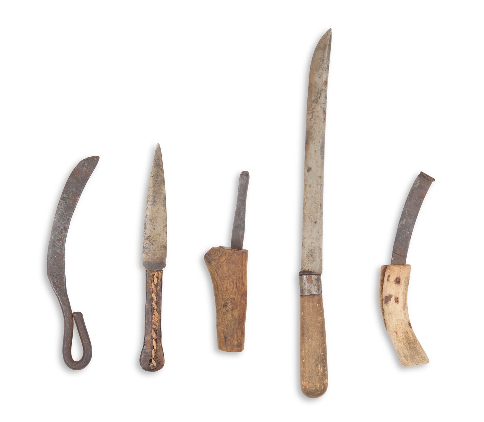 Five Blacksmith- or Bench-Made Knives and Tools: Five Blacksmith- or Bench-Made Knives and Tools late 19th/early 20th century, including: a skinning knife, made from bar stock, in one piece, the bar turned to form a loop handle, l. 9"; a crude 