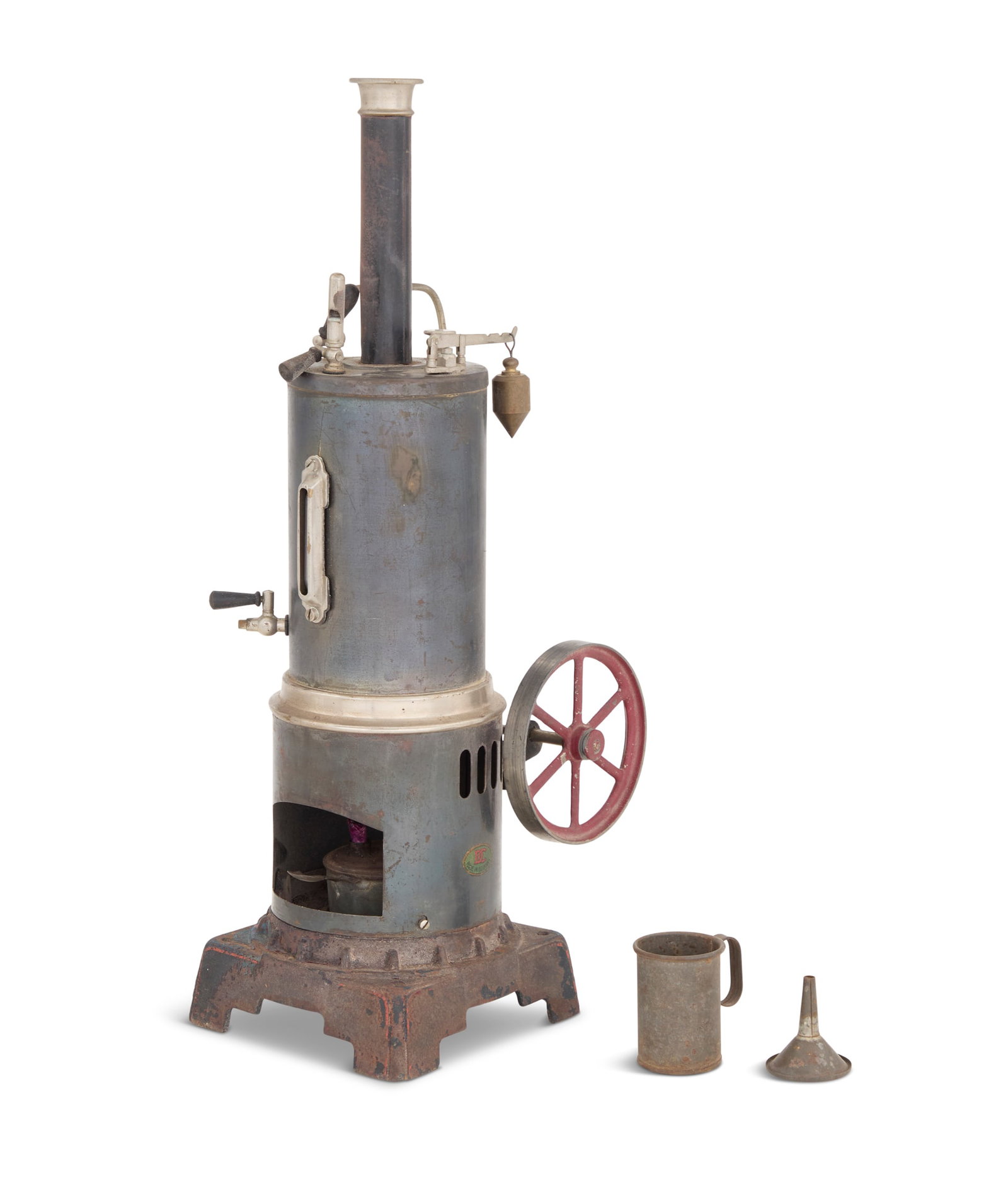 Doll & Co. Toy Steam Engine: Doll & Co. Toy Steam Engine mid-20th century, Nuremburg, Germany, model 321/5, with iron base and brass boiler, with safety valve, steam whistle, water screw, painted and nickel-plated flywheel, burne