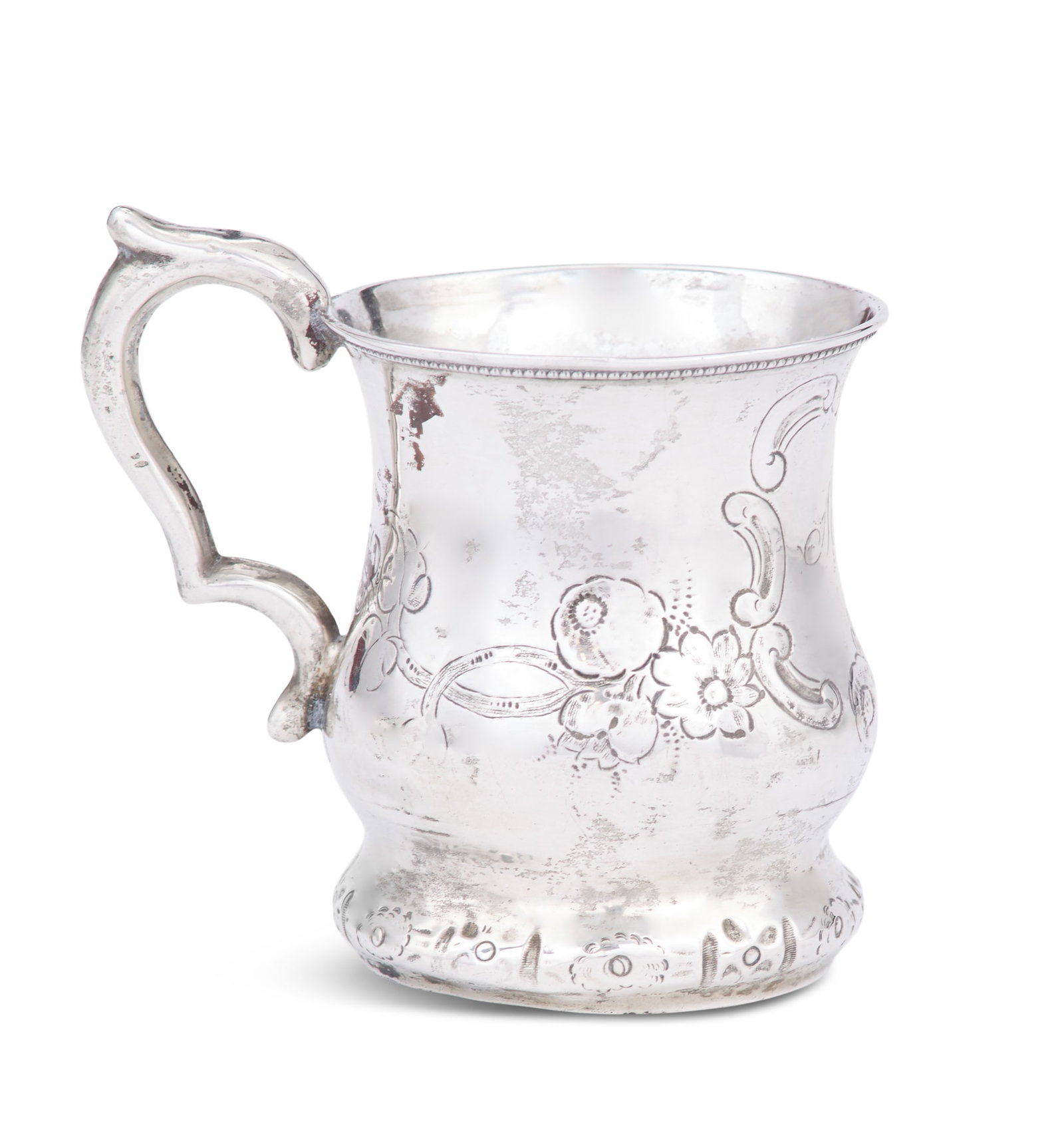 American Coin Silver Mug: American Coin Silver Mug unmarked, ca. 1850, the baluster body with torus base and decorated with chased flowers centering a rococo cartouche, with crested double-scroll handle, monogrammed "MWW&