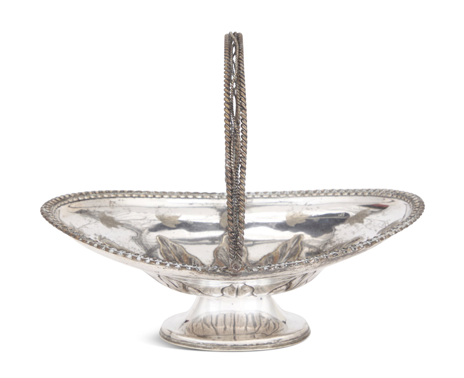 American Silverplate Cake Basket: American Silverplate Cake Basket third quarter 19th century, of oval form with upswept ends, decorated with repousse foliate calyx and engraved ivy leaf banding, with ovolo rim and twisted wirework sw