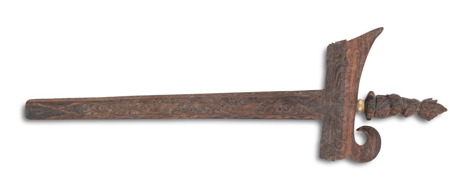 Indonesian Kris: Indonesian Kristhe wavy damascene blade with mid-rib, with figural carved rosewood hilt; the rosewood scabbard intricately carved with scrolls and masque.blade l. 16", overall l. 20-1/2" (23