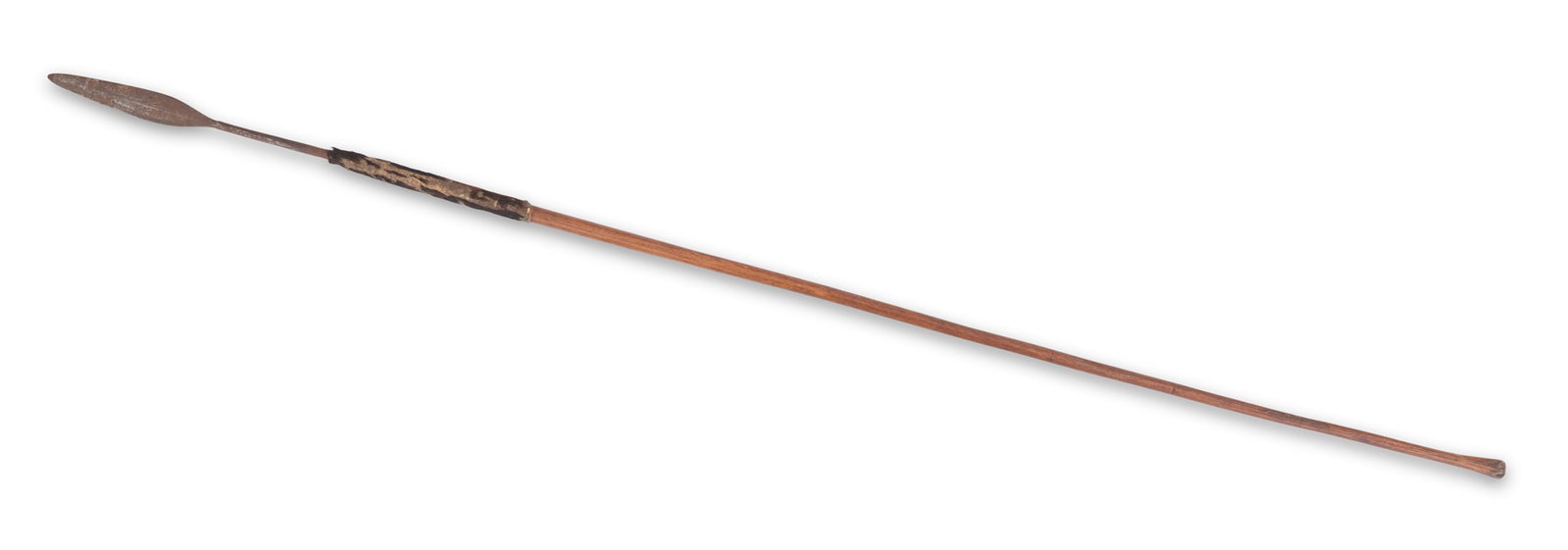 Zulu Assegai: Zulu Assegai mid-to-late 19th century, with smooth shaft and fur-covered hide socket. blade l. 10-1/4", overall l. 52-1/4"