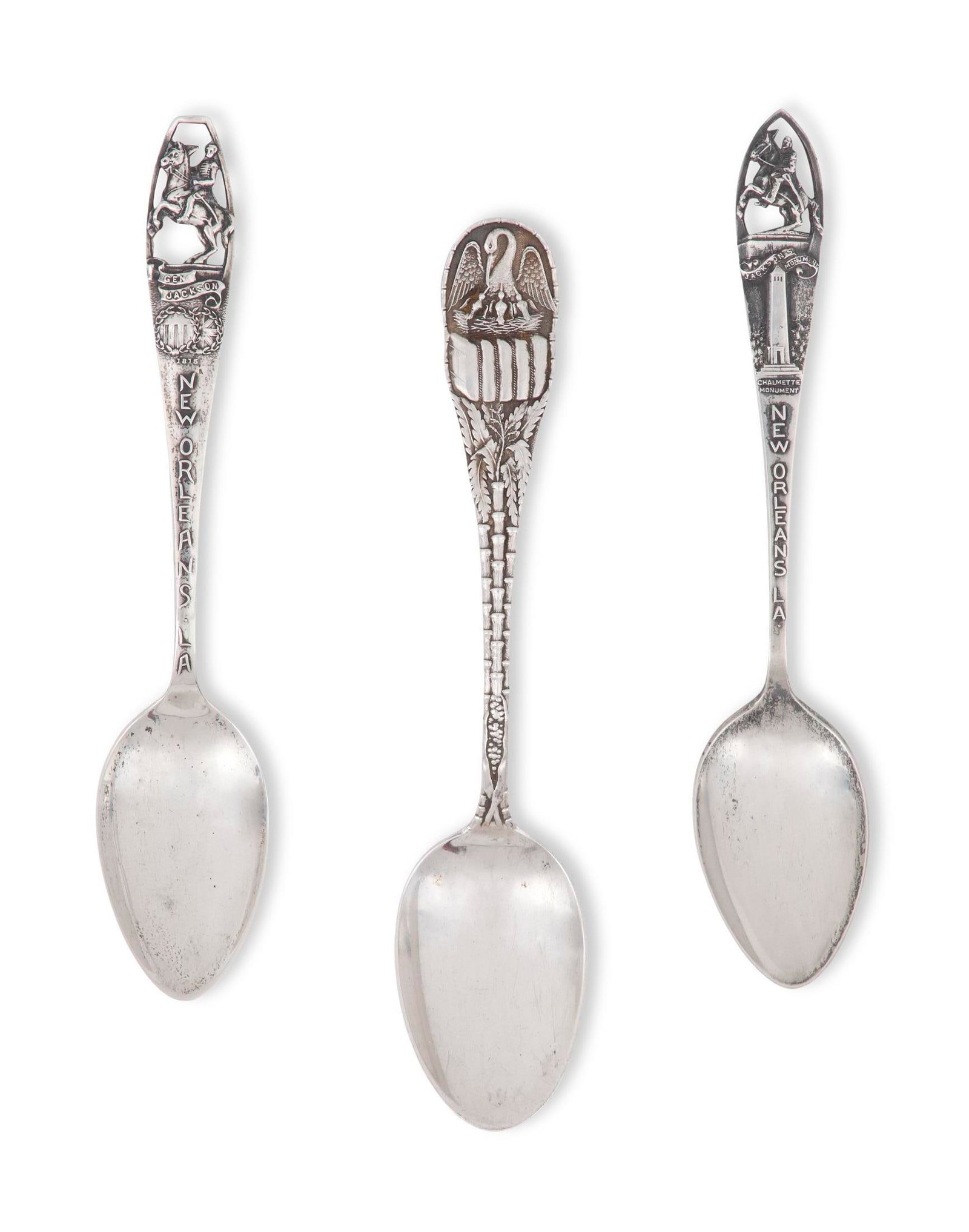 Three New Orleans Sterling Silver Souvenir Spoons: Three New Orleans Sterling Silver Souvenir Spoons including: a Durgin spoon, retailed by M. Scooler, New Orleans, with pelican, cotton bale and sugar cane, l. 5-3/4"; a Charles M. Robbins spoon, 