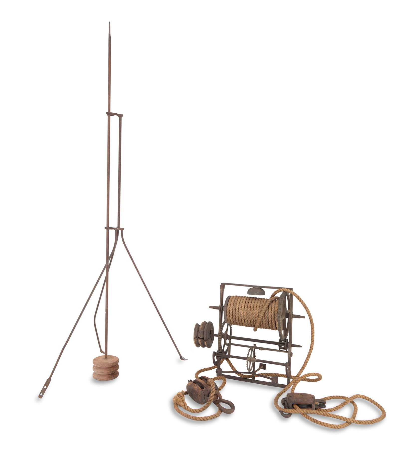 Iron and Brass Weight-Driven Tournebroche: Iron and Brass Weight-Driven Tournebroche18th century, comprising a motor, spit rod, and support, with turned wood blocks and bell.spit rod l. 49-1/2"; motor h. 13", w. 15-1/2", d. 7&qu