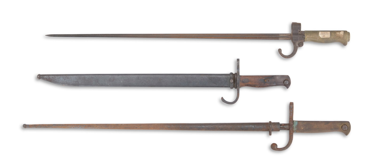 Three Bayonets: Three Bayonets including: a French Model 1886 Lebel, the first and longest version of the model, with cruciform blade; with scabbard; blade l. 20-1/4", overall l. 25" (26-3/4" with scab