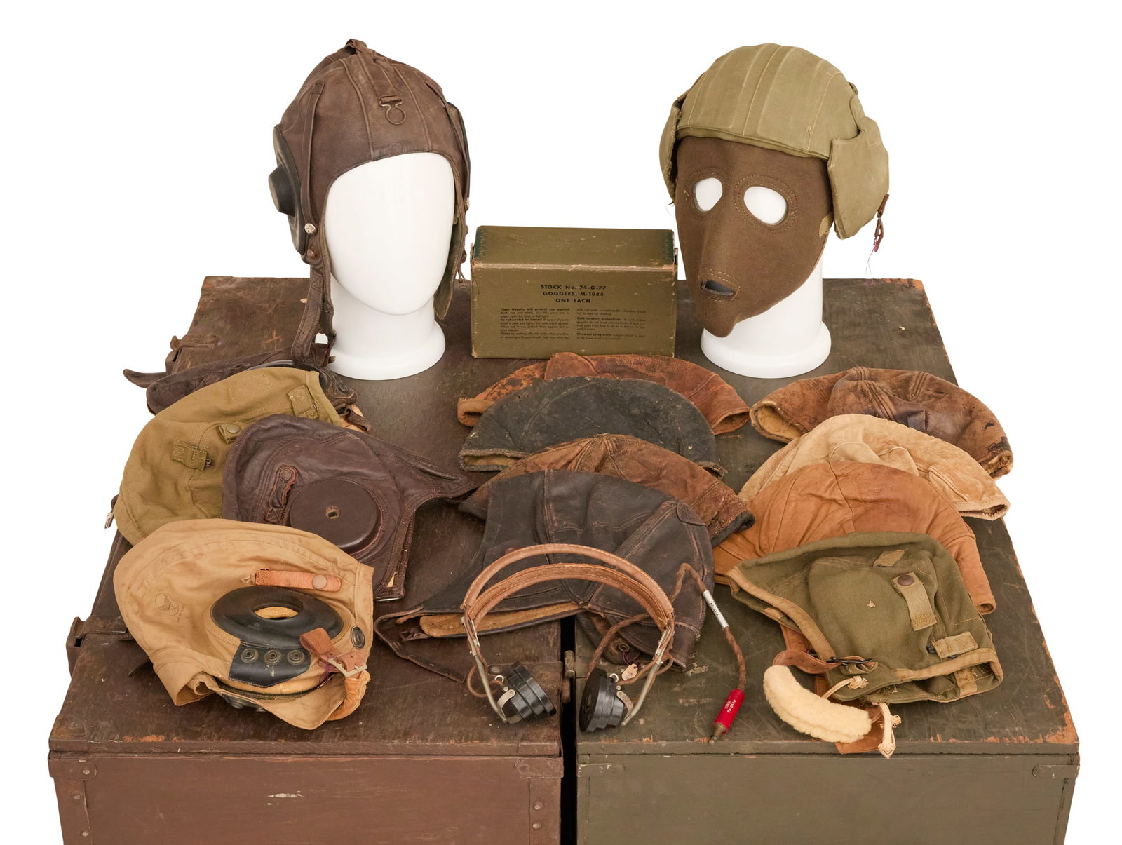Collection of Flight Helmets and Headgear: Collection of Flight Helmets and Headgear including: an HS-33A CBRR headset comprising ANB-H-1 receivers and HB-7 headband, a Type D-1 USAAF cold weather face mask, Polaroid M-1087 instrument flying t