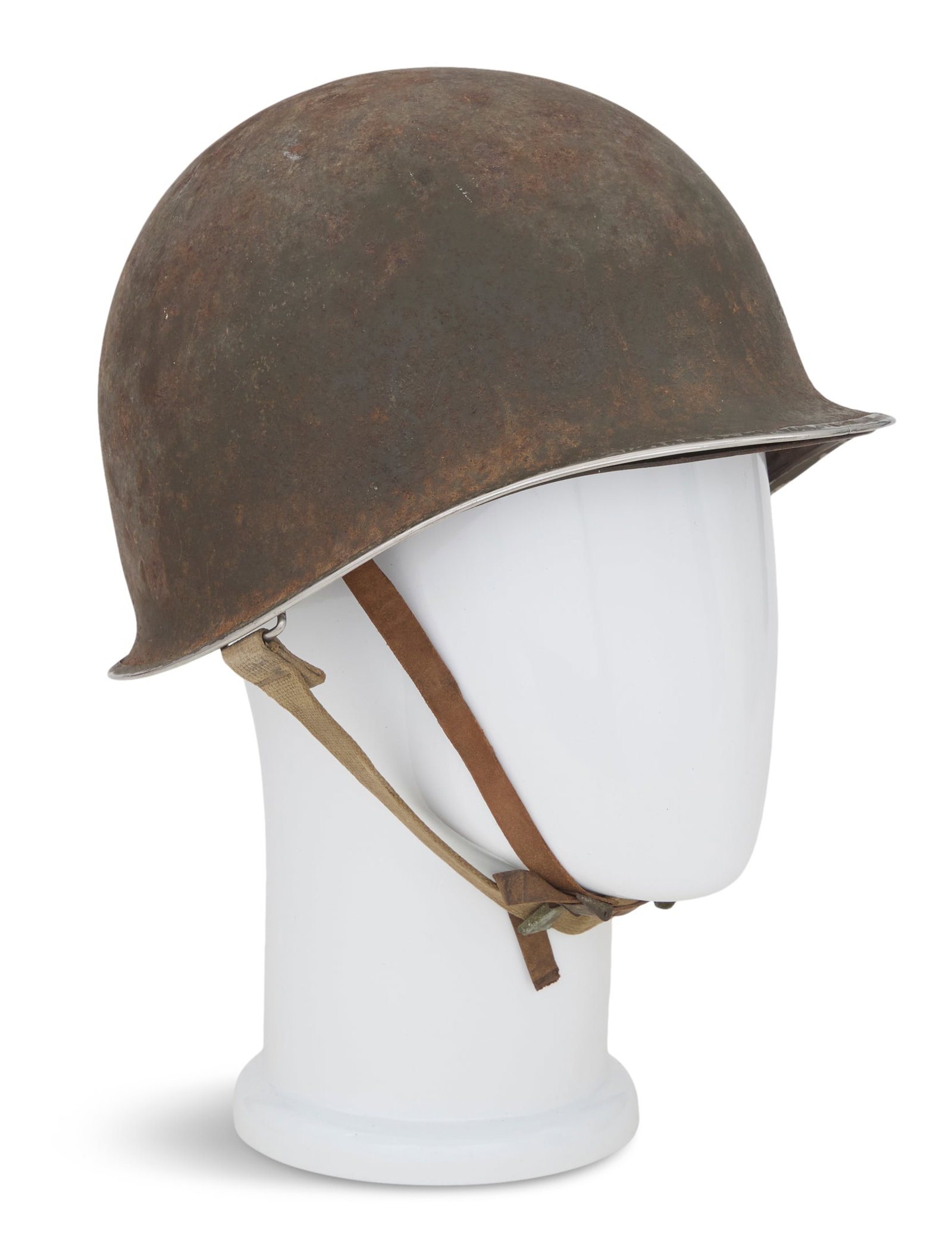 Named WWII U.S. M-1 Helmet: Named WWII U.S. M-1 Helmet first pattern, with M-1 second pattern plastic liner, named on the interior front edge "Barcelo W****D / 3817-****], with two period mortar firing tables tucked in the 