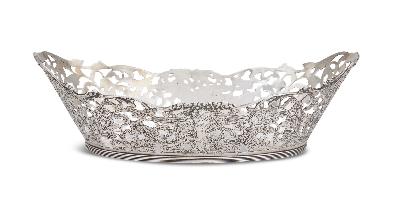 Dutch Silver Presentation Dish: Dutch Silver Presentation Dish 1932, by B.W. van Eldik & A.F. van der Scheer, Zutphen, oval with upswept ends, pierced and engraved with eagles among floral scrolls, with shaped and applied floral scr