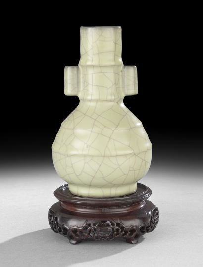 Good Chinese Guan Ware Archer's Handle Vase: Good Chinese Guan Ware Archer's Handle Vase, 18th/19th century, the ribbed globular body and neck with tubular archer's handles, glazed in a light celadon glaze with gold wire crackle, the celadon gla
