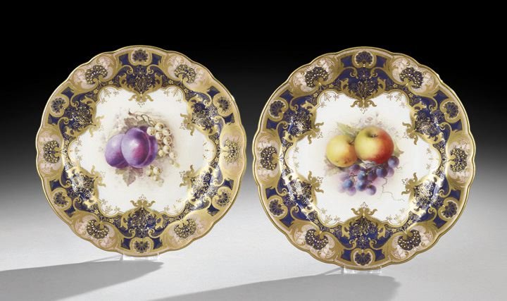 Pair of Royal Worcester Cabinet Plates: Pair of Royal Worcester Hand-Painted Cabinet Plates, ca. 1911, English, the scalloped borders decorated with raised gilt-scrolled cartouches alternating with raised gilt shells set on a pale pink grou