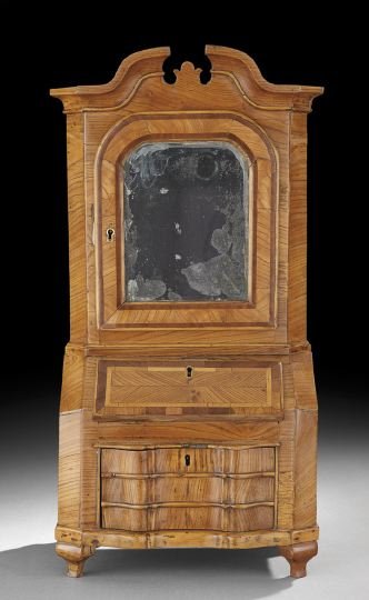 Continental Baroque Miniature Secretary: Continental Baroque Miniature Secretary, fourth quarter 18th century, comprised of various veneers, including fruitwood and walnut over a pine secondary, the reverse serpentine base resting on cabriol
