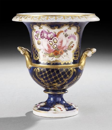 English Porcelain Garniture Vase: English Porcelain Garniture Vase, second quarter 19th century, the round foot decorated with floral painting in reserve panels, the lower portion of the urn with gilt diapering and bellflowers, the up