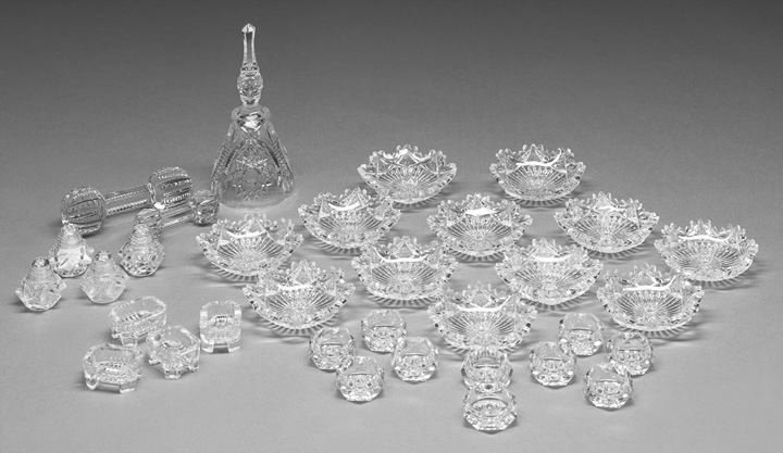 Thirty-Three Piece Collection of Pressed and Cut-G: Thirty-Three Piece Collection of Pressed and Cut-Glass Tableware, consisting of twelve cut-glass "snowflake" condiment bowls, dia. 4", a pressed glass dinner bell, h. 7-1/2", twelve various pressed gl