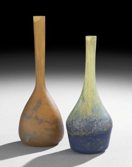 Two Patte de Verre Vases: Two Patte de Verre Vases, first quarter 20th century, the shorter example, mottled green and blue and signed "Daum Nancy" in script on the lower side, h. 7-1/2". the taller amber example mottled with