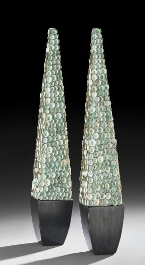 Pair of Attractive Obelisks: Pair of Attractive Obelisks, each completely encrusted in blue limpet shells and within a tapering ebonized base, h. 27-1/2".