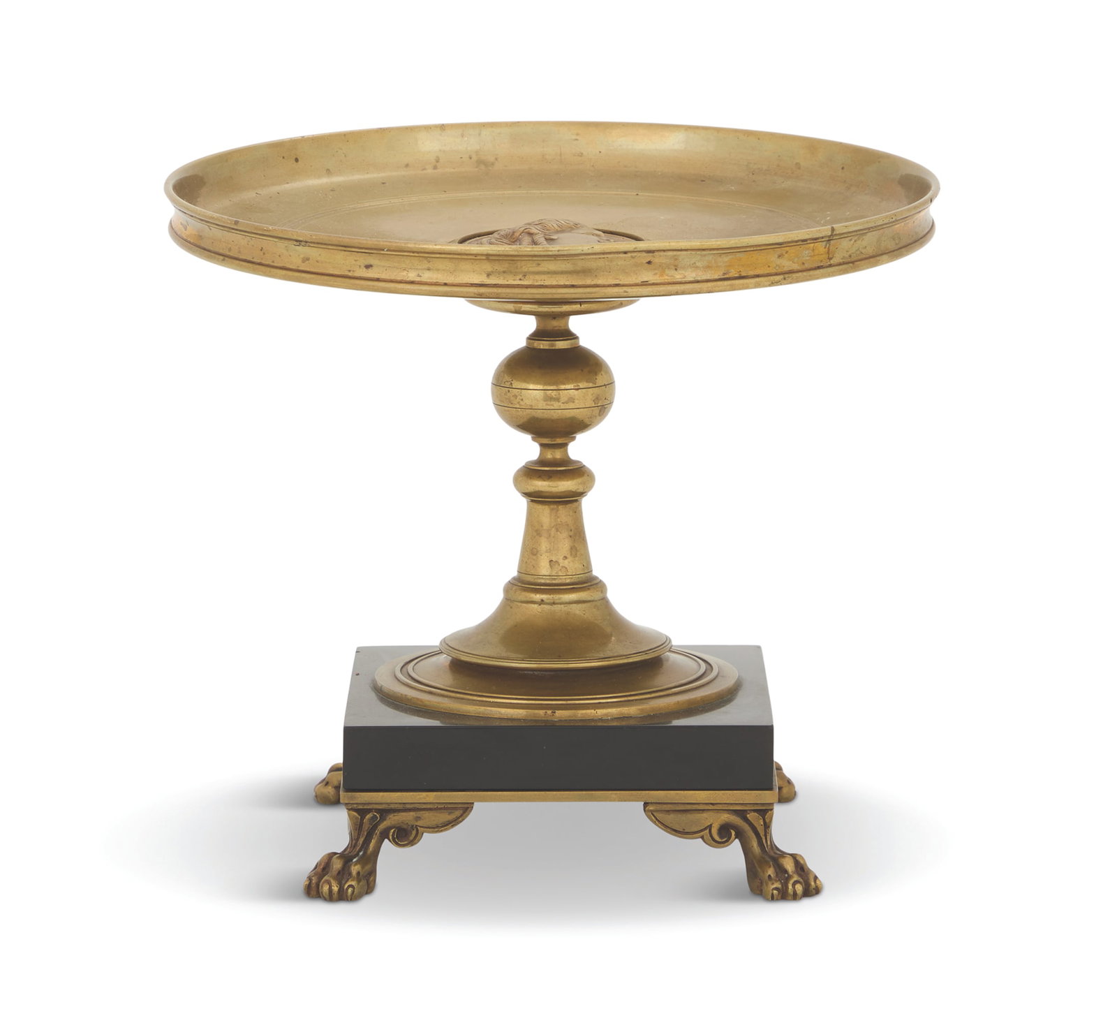 French Neo-Grec Bronze and Marble Tazza: French Neo-Grec Bronze and Marble Tazza third quarter 19th century, the center with a roundel decorated with the profile of a Greek nymph, on a graduated and turned conical base, resting on a black ma