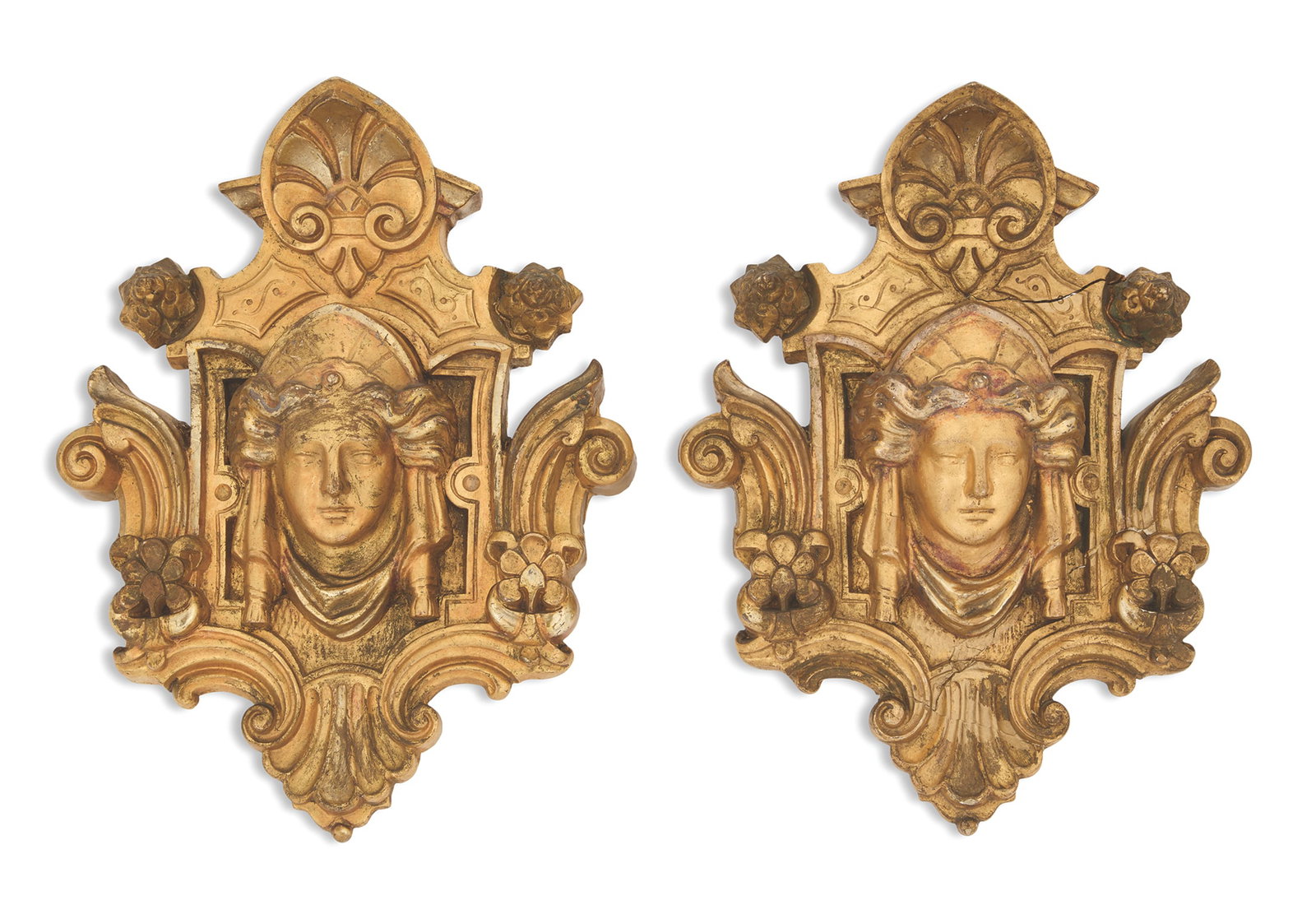 Pair of Renaissance Revival Giltwood Appliques: Pair of Renaissance Revival Giltwood Appliques ca. 1870, probably architectural fragments, with anthemia crests and Athena masques, framed with scrollwork and flower heads. h. 15-1/4", w. 10-3/4&