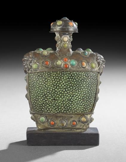 Chinese Mongol-Style Snuff Bottle: Chinese Mongol-Style Snuff Bottle, late 19th/early 20th century, the base metal inset with cabochons of coral and turquoise, shagreen body, h. 3-1/2".