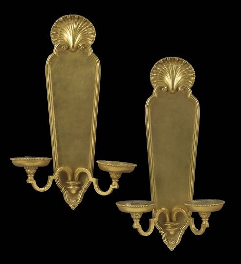 Pair of Georgian Revival Sconces: Pair of Georgian Revival Sconces, ca. 1900, E.F. Caldwell & Company, New York, the cartouche-form backplates molded with scrolls and shell-form crests, the scrolled arms support candle sockets with be