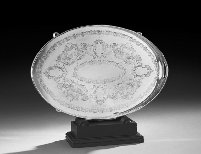 Edwardian Silverplate Tray: Edwardian Silverplate Tray, first quarter 20th century, by Harrison Brothers & Howson, Sheffield, of oval form with pierced gallery and integral handles, the plateau with concentric flat-embossed scro