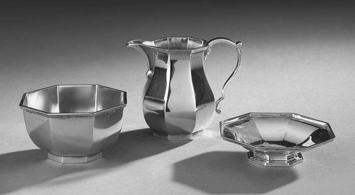 English Sterling Silver Creamer and Sugar Bowl: English Sterling Silver Creamer and Sugar Bowl, hallmarked London, 1966-1970, by Richard Comyns, retailed by Cartier, in the George I taste, each octagonally paneled, the creamer of baluster shape wit