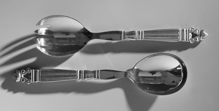 Pair of Jensen Sterling "Acorn" Salad Servers: Pair of Georg Jensen Sterling Silver "Acorn" Salad Servers, the pattern designed in 1915 by Johan Rohde (1866-1935), Copenhagen, with the post-1945 Jensen mark, with stainless steel bowl and tines, l.