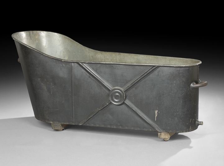 French Painted Tole Bathtub: French Painted Tole Bathtub, 19th century, of coffin form, each end fitted with a handle, the sides ornamented with an "X" centered by a roundel, h. 28-1/2", l. 60", d. 23-1/2".