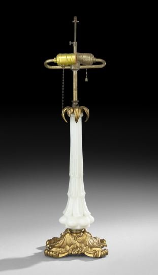 English Opaline and Brass Lamp Standard: English Opaline and Brass Lamp Standard, mid-19th century, now mounted as an electric lamp, design registered 1845, the leaf-molded brass base stamped with an English registry mark, the iron underplat
