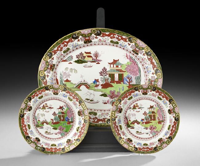 Three Pieces of Ashworth Ironstone Porcelain: Three Pieces of Ashworth Ironstone Porcelain, fourth quarter 19th century, English, comprised of a platter with two matching plates, decorated with a willow-type pattern, executed in Chinese red trans
