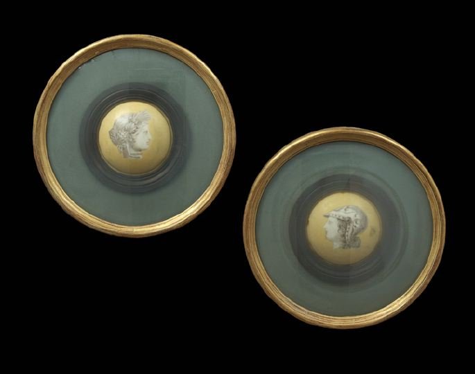 Pair of Neo-Grec Painted Stone Rondels: Pair of Continental Neo-Grec Painted Stone Rondels, decorated en grisaille with Roman soldiers' heads on a tan ground, the convex stone rondels are velvet-matted in contemporary giltwood frames, dia. 