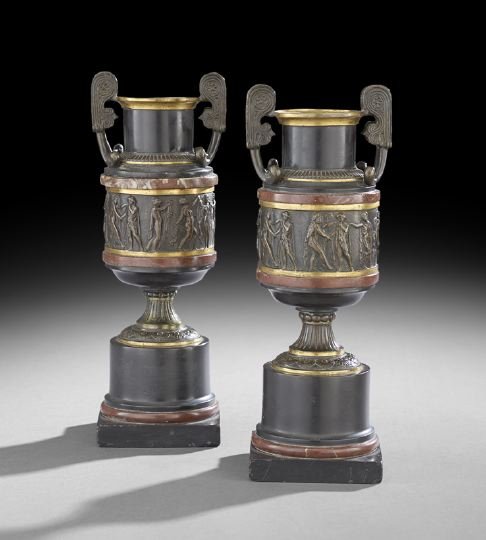 Pair of Napoleon III Neo-Grec Garniture Urns: Pair of Napoleon III Neo-Grec Bronze and Marble Garniture Urns, third quarter 19th century, French, the black marble bases trimmed in rouge marble, the vases made of alternating black marble, rouge ma