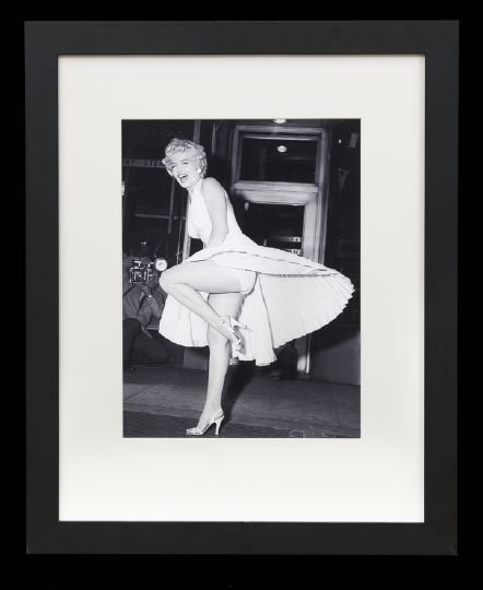 Milton H. Greene (American, 1922-1985): Milton H. Greene (American, 1922-1985), "Marilyn Monroe in The Seven Year Itch", black and white photograph, unsigned, sight 15-1/2" x 11-1/2". Glazed, matted and framed.