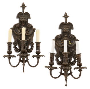 Pair of Contemporary Patinated Bronze Sconces: Pair of Contemporary Patinated Bronze Sconces in the Baroque taste, the backplates decorated with lion's heads framed in scrollwork, and supporting three scrolled candle arms set with floriform drip