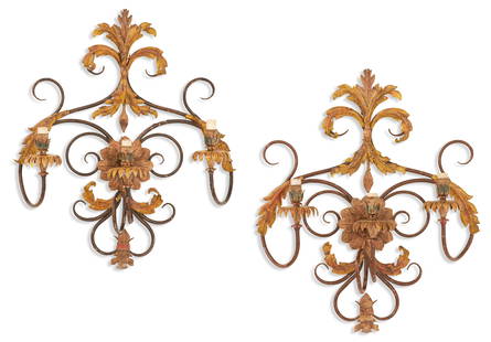 Pair of Italian Tole Sconces: Pair of Italian Tole Sconces 20th century, the tubular scrolled backplates decorated with applied patinated yellow leaves and flowers, the scrolled candle arms set with floriform drip pans and candle