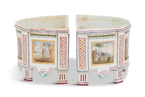 Pair of French Faience Bough Pots: Pair of French Faience Bough Pots ca. 1900, in the Marseille style, the commode-form pots decorated with polychrome panels of figures in landscapes, the upper rims painted with green bellflowers,
