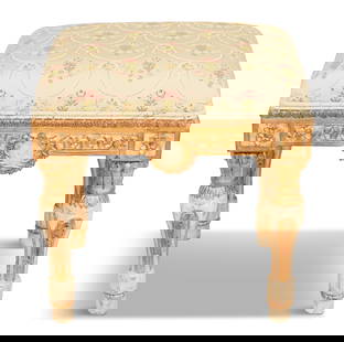 Italian Creme-Peinte and Parcel-Gilt Stool: Italian Creme-Peinte and Parcel-Gilt Stool 20th century, the carved frame centered with a wreath on each apron, raised on turned and carved legs. h. 18", w. 16-1/2", d. 13"