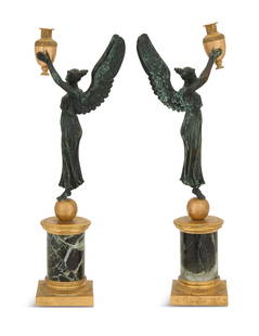 Pair of French Bronze and Marble Taper Sticks: Pair of French Bronze and Marble Taper Sticks late 19th century, in the Empire taste, the patinated figures of "Victory" holding aloft bronze dore urn-form taper holders, on column-form