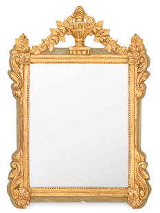 French Parcel-Gilt Mirror in the Directoire Taste: French Parcel-Gilt Mirror in the Directoire Taste late 19th century, the pierced crest with an urn-form finial, supporting swags of fruit, the carved giltwood surround with corner medallion blocks