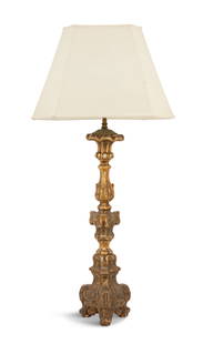 Italian Giltwood Altar Stick Lamp: Italian Giltwood Altar Stick Lamp ca. 1800, the fluted floriform drip pan over a complex tripartite standard carved with leaves, scrollwork and cabochons, raised on scrolled feet, fitted with a